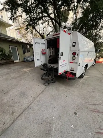 Magnet Plumbing service vehicle on-site for Grease Trap Cleaning in Port of Miami
